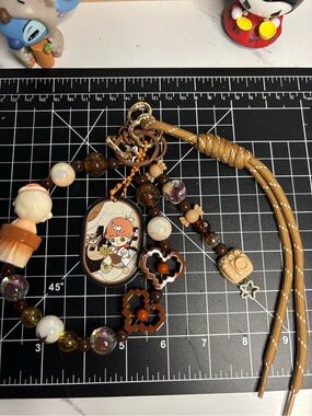 Cute Character Badge Lanyard with Brown and Gold Accents keychains